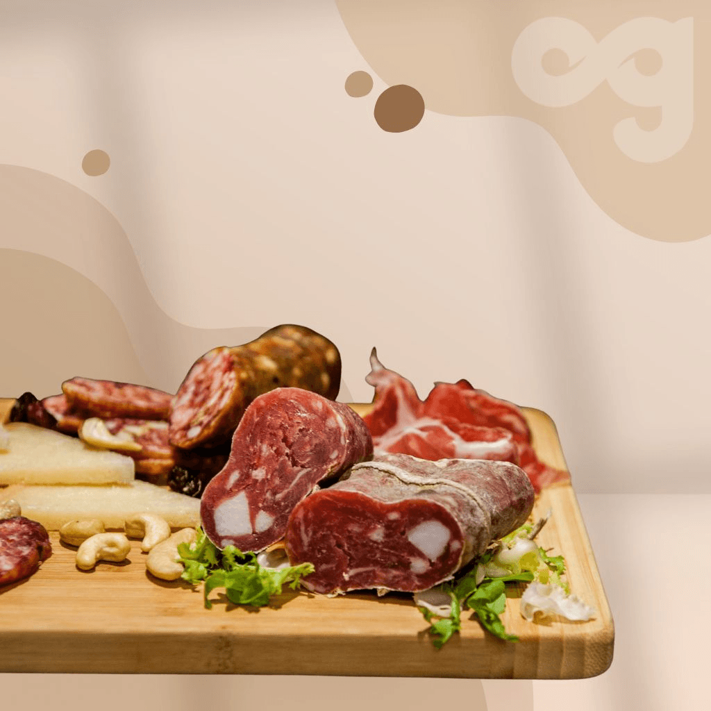 Traditional Turkish cold cuts including sucuk, pastirma, and kavurma arranged on a wooden board